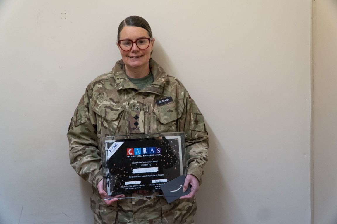 Lieutenant Louise McCauley holding her CARAs award